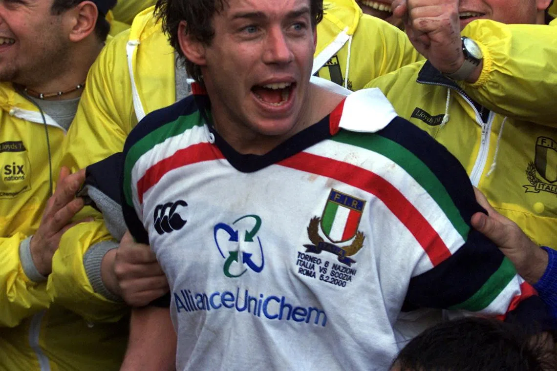 FILE PHOTO: Italy's Diego Dominguez celebrates after his team beat Scotland during their Six Nations Championship rugby match at Flaminio stadium in Rome February 5. Italy won the match 34-20.    VP//ME/File Photo