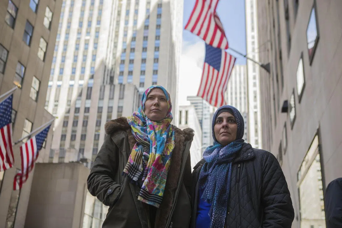 Jamilla Clark (left) and Arwa Aziz said their rights were violated when they were forced to remove their hijabs before the police took arrest photographs in New York on March 14, 2018. 