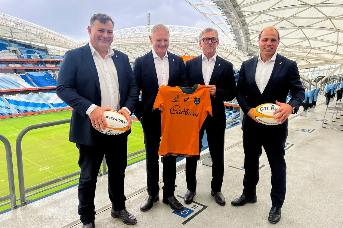 FILE PHOTO: Rugby Australia Director of High Performance Peter Horne, Australian National team Rugby Union coach-in-waiting Les Kiss, Australian National Rugby Union team current coach Joe Schmidt and Rugby Australia Chief Executive Phil Waugh pose at Sydney Football Stadium in Sydney, Australia April 30, 2025 . REUTERS/Nick Mulvenney/File Photo
