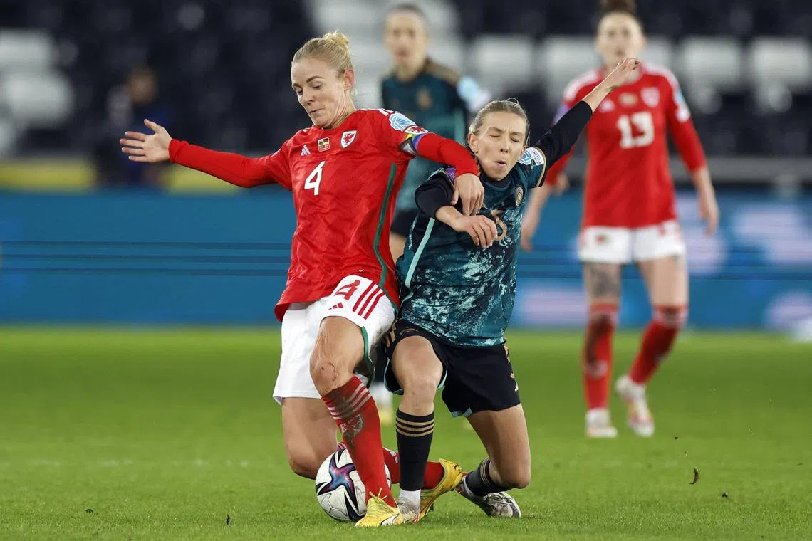 Soccer Football - UEFA Women's Nations League - Group C - Wales v Germany - Liberty Stadium, Swansea, Wales, Britain - December 5, 2023 Wales' Sophie Ingle in action with Germany's Elisa Senss Action Images via Reuters/Peter Cziborra/File Photo