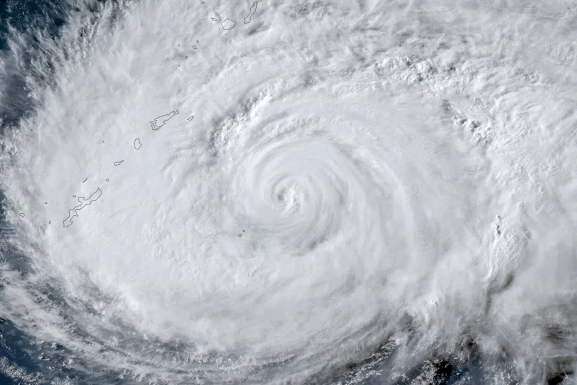 Japan orders evacuations as Typhoon Dolphin approaches, cancels 500 flights