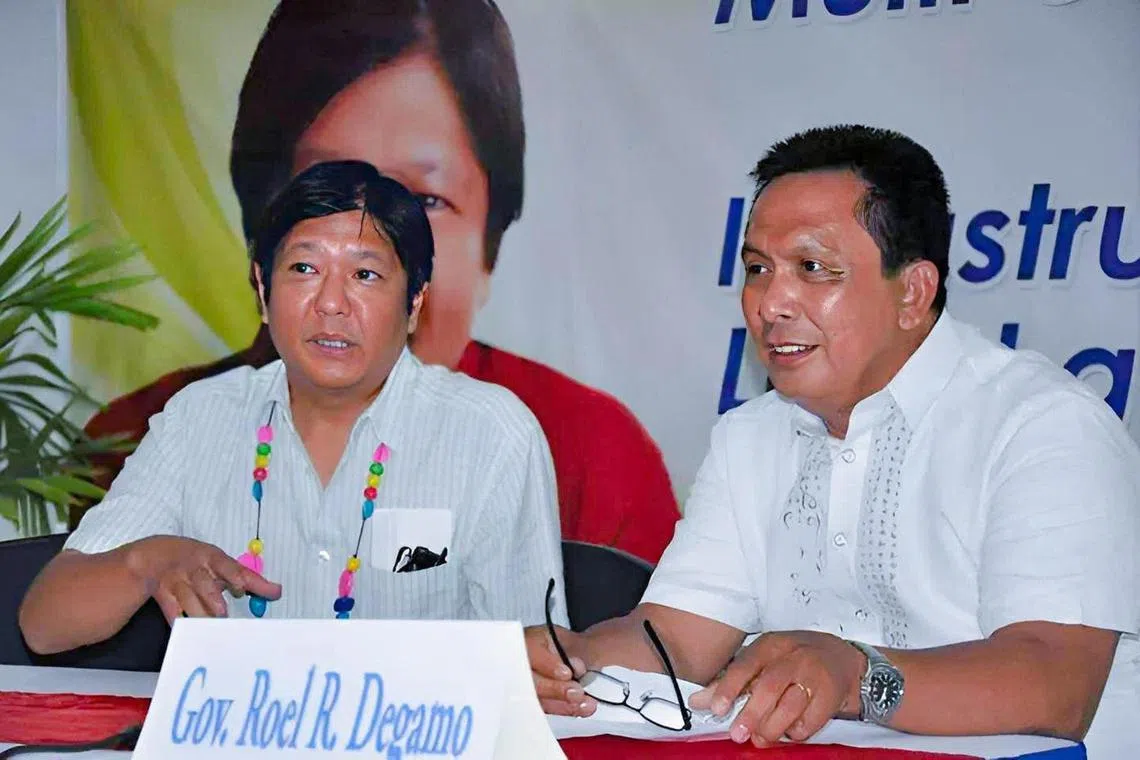 Mr Roel Degamo (right), governor of the Philippine province of Negros Oriental, was an ally of President Ferdinand Marcos (left).