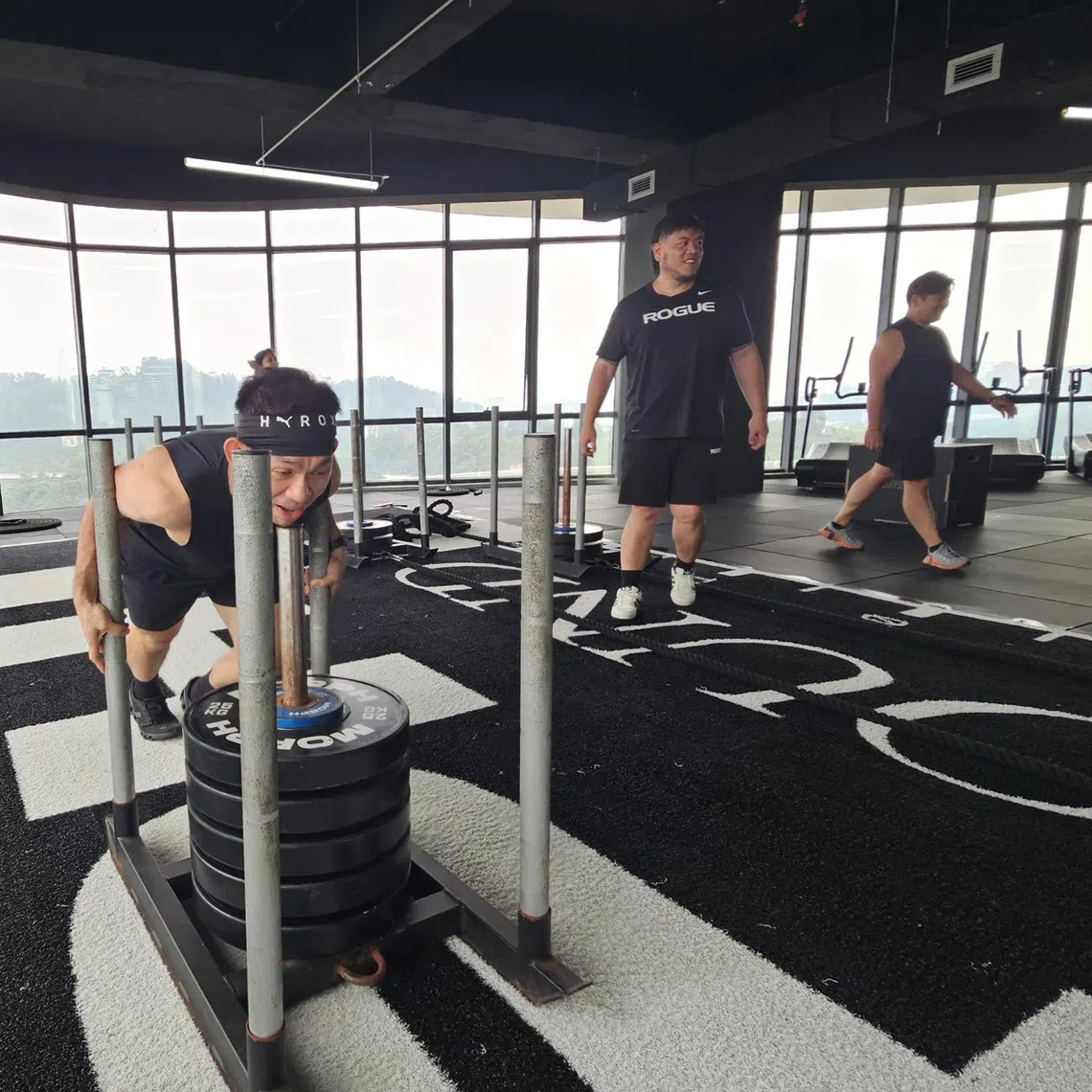 Hyrox veteran Chan Kheng Fai pushing 125 kg during a training session at MORPH KLGCC in Kuala Lumpur on Sept 14.