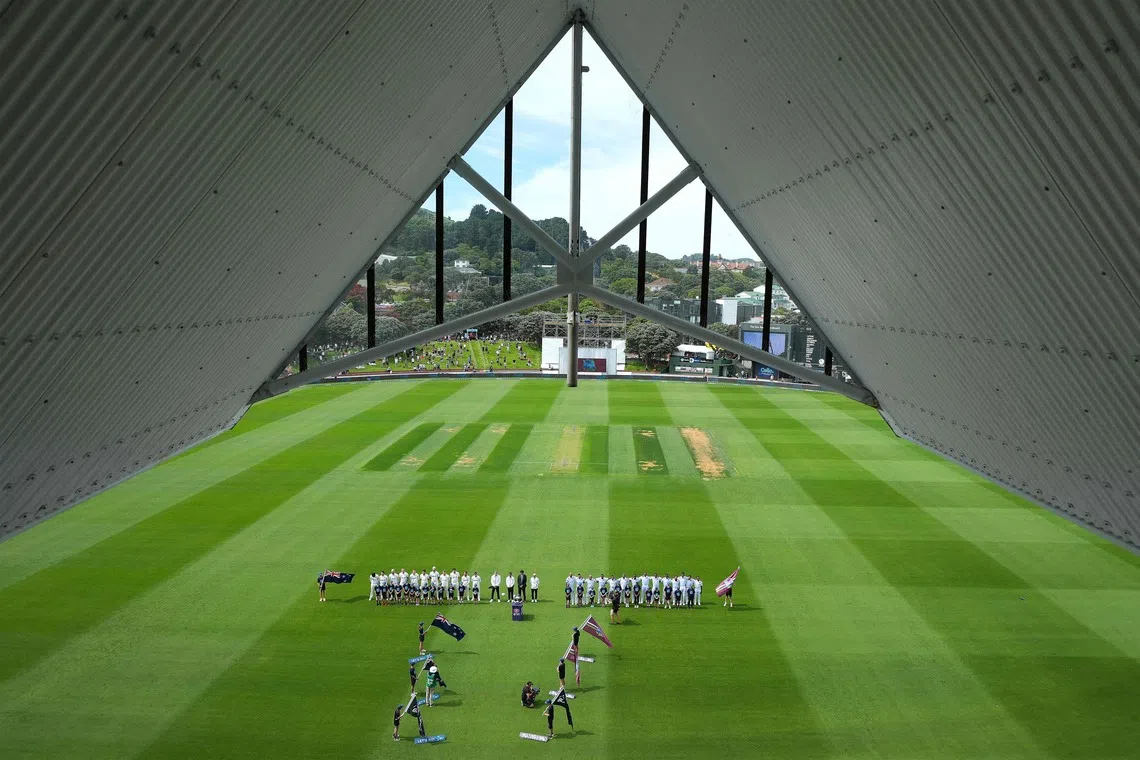 New Zealand (left) with the West Indies standing for the national anthems on the first day of the second international test cricket match between New Zealand and West Indies, at the Basin reserve in Wellington, on Dec 10, 2025. 