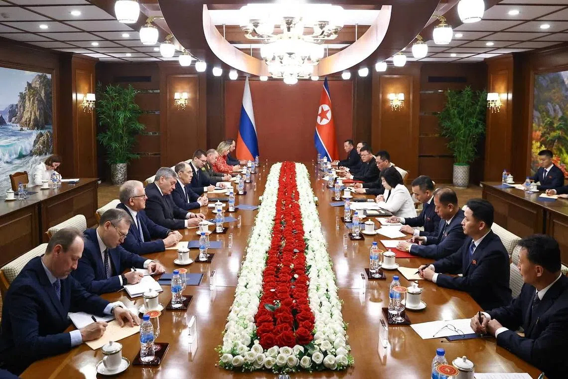 Russian Foreign Minister Sergei Lavrov (left, fifth from top) meeting his North Korean counterpart, Ms Choe Son Hui, in Wonsan, North Korea, on July 12.