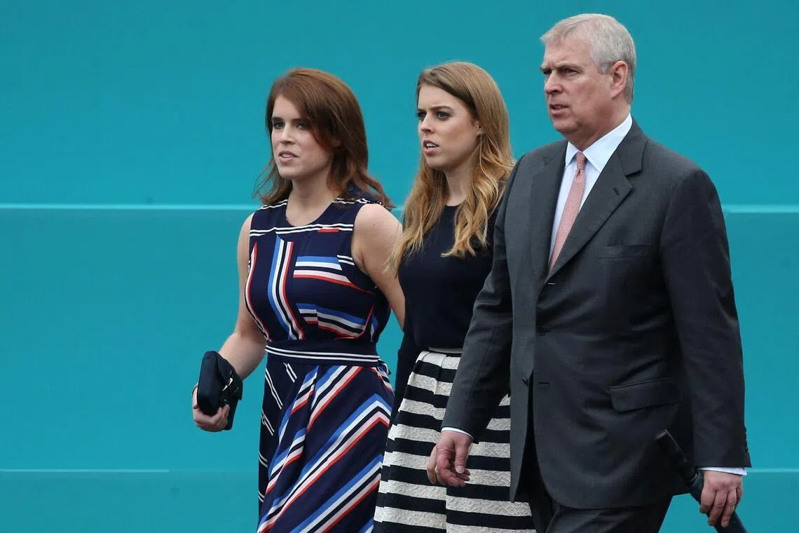 Britain's Princess Eugenie of York (left) and Princess Beatrice of York (right), daughters of Mr Andrew Mountbatten-Windsor, will not attend the traditional annual gathering for the family. 