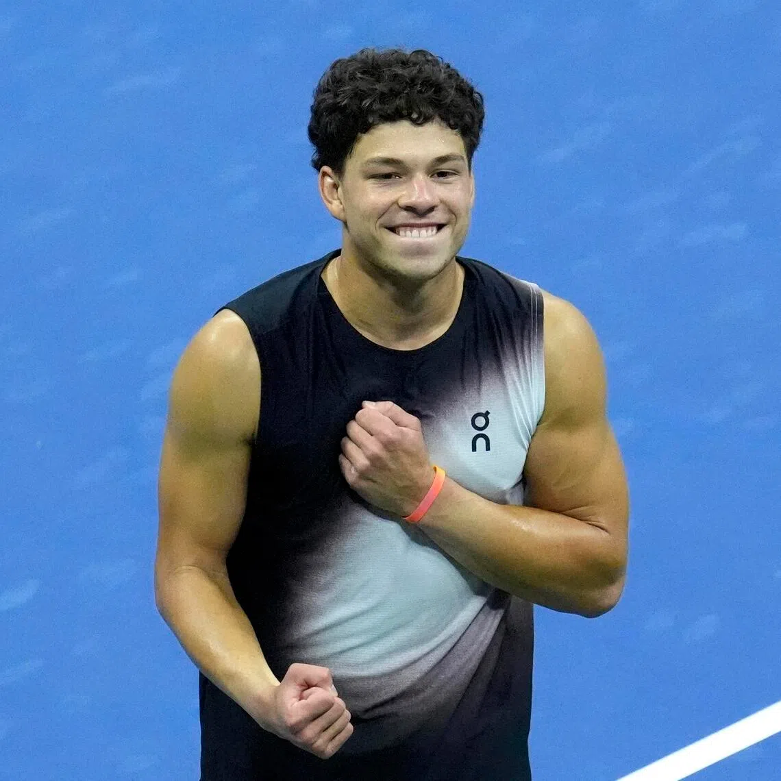 Ben Shelton celebrates winning his US Open semi-final match against Frances Tiafoe.