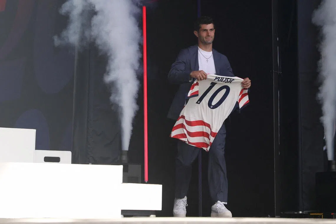 May 26, 2026; New York, New York, USA; Christian Pulisic walks on stage during the United States men's national team roster reveal for the 2026 FIFA World Cup at The Rooftop at Pier 17. Mandatory Credit: Pamela Smith-Imagn Images