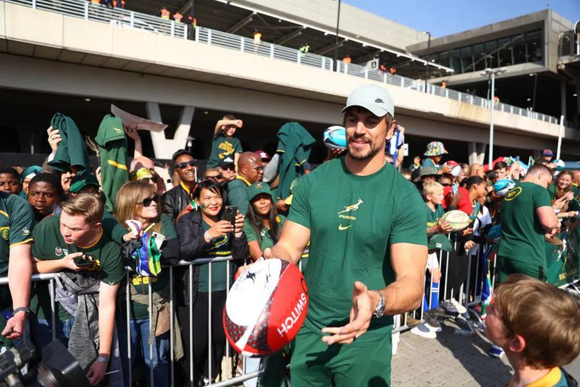 FILE PHOTO: Rugby Union - South Africa start their journey to the Rugby World Cup in France - OR Tambo International Airport, Johannesburg, South Africa - August 12, 2023 South Africa's Eben Etzebeth with fans during the official public send-off for the Springboks REUTERS/Siphiwe Sibeko/File Photo
