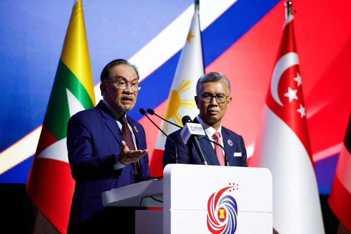 Malaysian Prime Minister Anwar Ibrahim Malaysia’s International Trade and Industry Minister Tengku Zafrul Tengku Abdul Aziz during the Asean Summit at Kualua Lumpur on May 27.