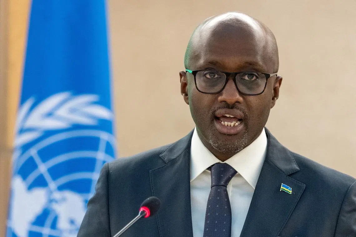 FILE PHOTO: Olivier Nduhungirehe, Minister for Foreign Affairs and International Cooperation of Rwanda addresses the Human Rights Council at the United Nations in Geneva, Switzerland, February 26, 2025. REUTERS/Denis Balibouse/File Photo