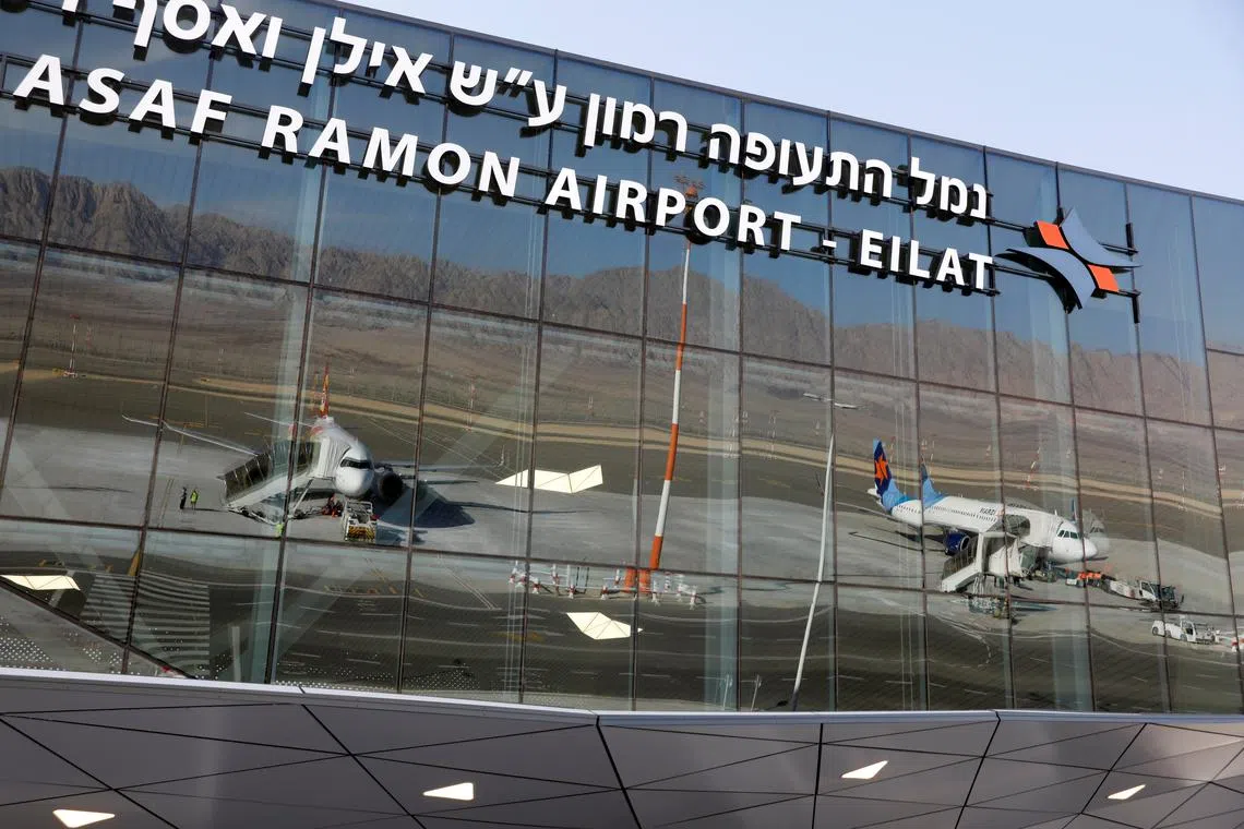 FILE PHOTO: Planes are reflected in the facade of the Ramon International Airport after an inauguration ceremony for the new airport, just outside the southern Red Sea resort city of Eilat, Israel January 21, 2019. REUTERS/Ronen Zvulun/File Photo