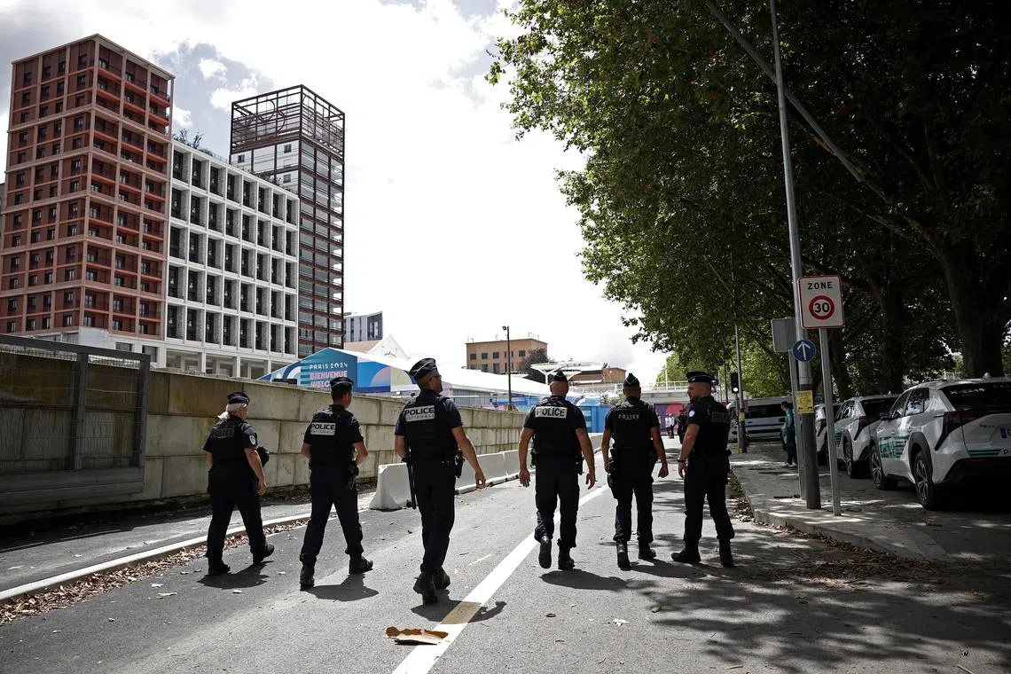 Paris 2024 Olympics - Press visit at the Olympic and Paralympic athletes Village - Saint-Denis, France - July 16, 2024
Police officers are seen in the Olympic village REUTERS/Benoit Tessier