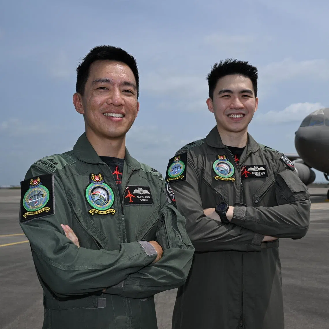 Major Simeon Chen (left) and Captain Gerald Goh who were part of the operation for the two repatriation flights, photographed with the MRTT on March 27.
