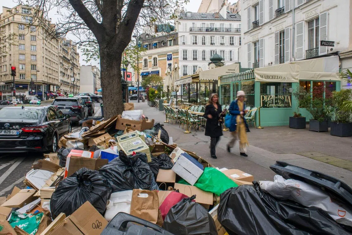 President Emmanuel Macron's polling numbers are falling, as rubbish builds up in the streets of Paris.