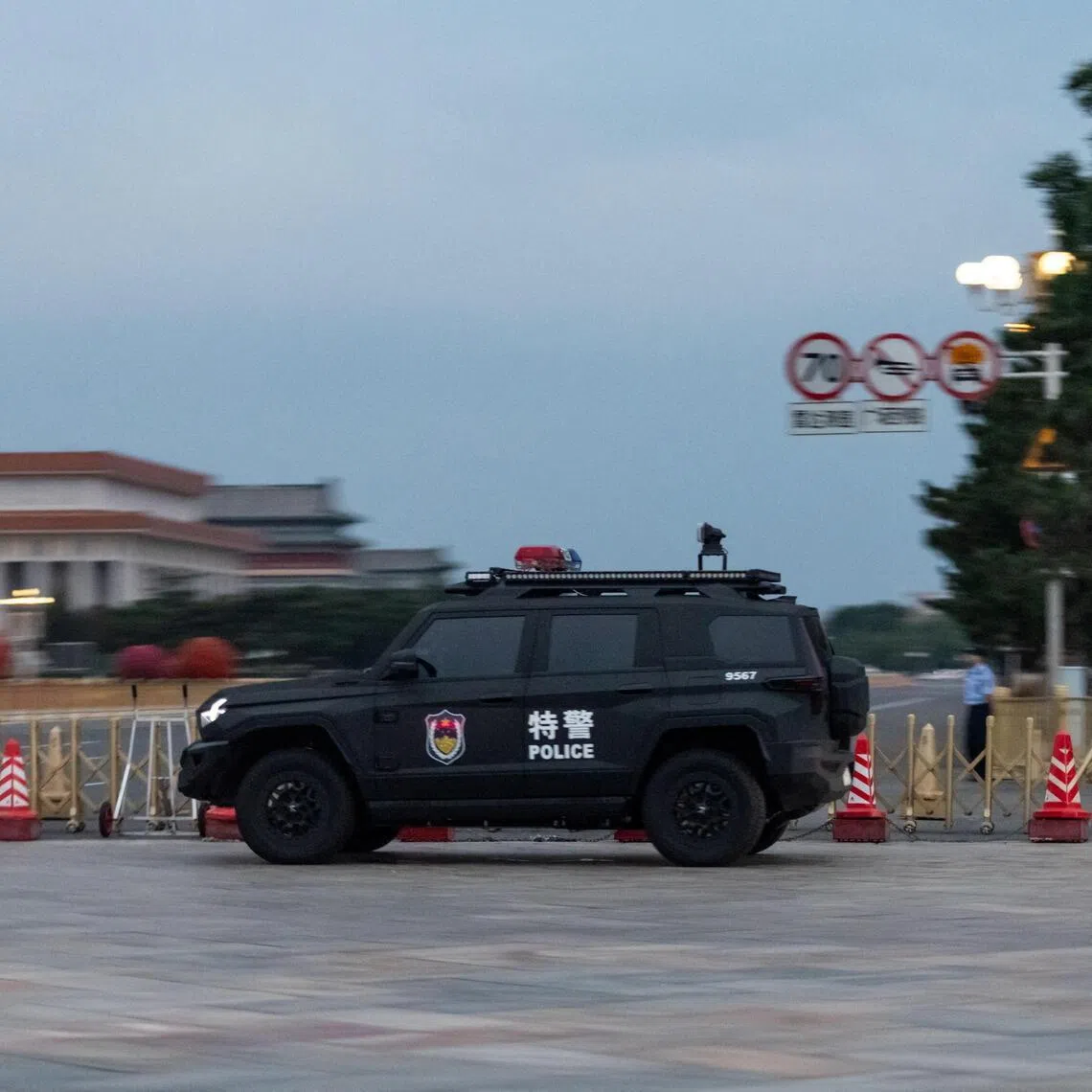 A police car is parked in Tiananmen Square in Beijing on June 3. The site was the scene of a deadly crackdown by Chinese authorities in 1989.
