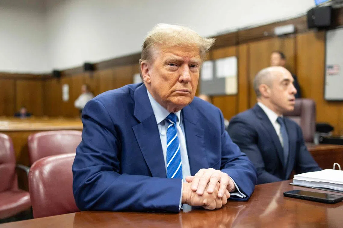 Former US president Donald Trump attends the second day of his trial for allegedly covering up hush money payments linked to extramarital affairs.