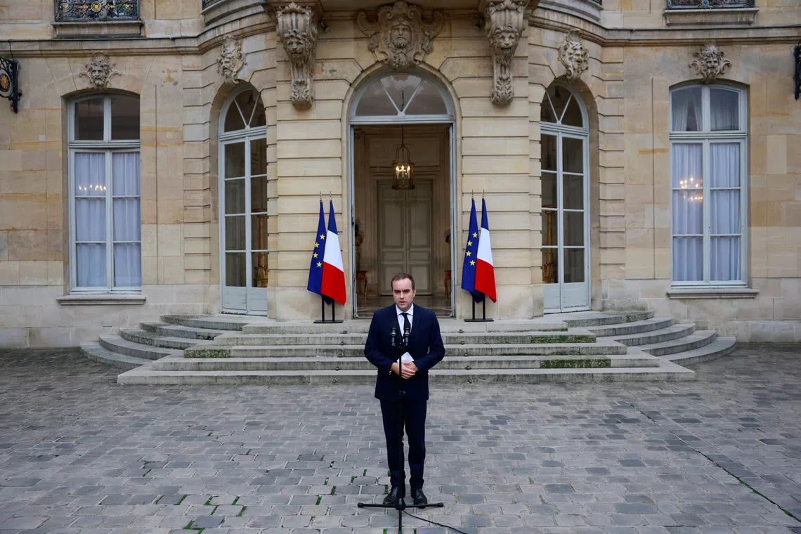 French outgoing Prime Minister Sebastien Lecornu delivers a statement in the courtyard at the Hotel Matignon in Paris after launching a series of talks with political parties' leaders as France faces a political crisis following the announcement of the resignation of the new government, France, October 8, 2025. REUTERS/Stephanie Lecocq/Pool