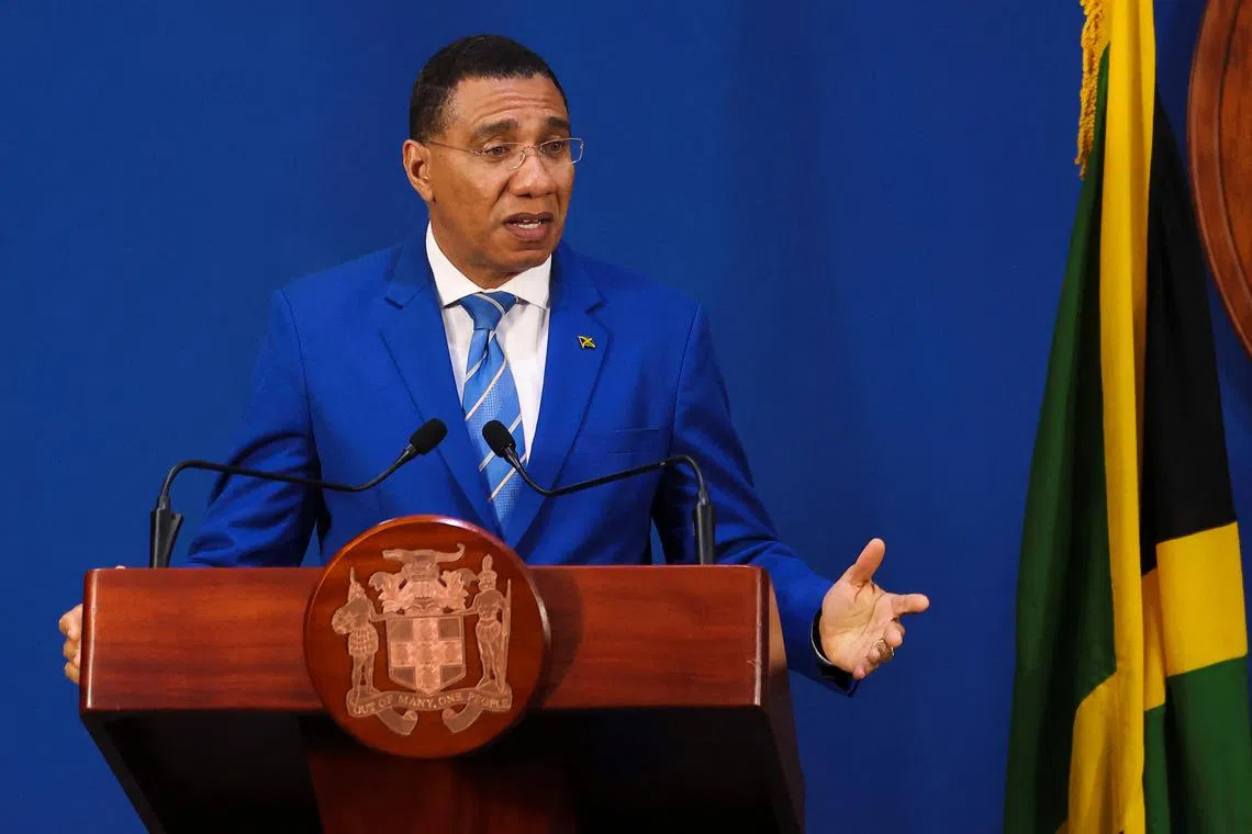 FILE PHOTO: Jamaica's Prime Minister Andrew Holness addresses the audience during a press conference in Kingston, Jamaica May 15, 2023. REUTERS/Gilbert Bellamy/File Photo