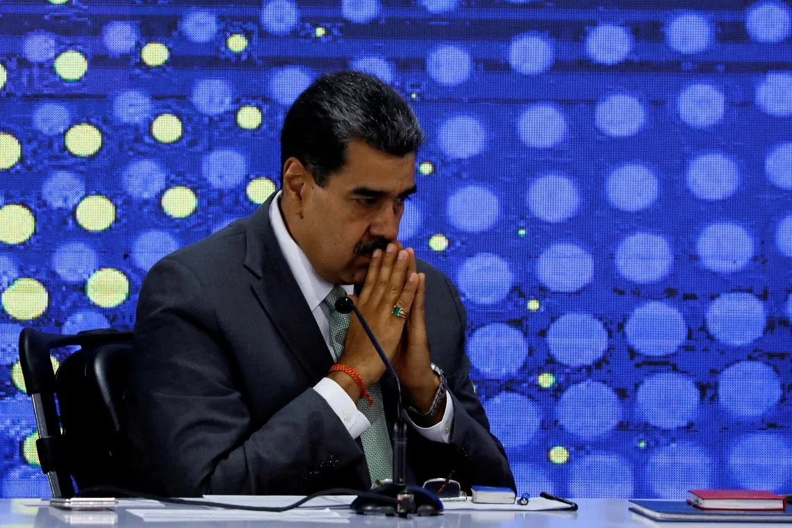 FILE PHOTO: Venezuelan President Nicolas Maduro attends an event at the National Electoral Council (CNE) in Caracas, Venezuela, December 4, 2023. REUTERS/Leonardo Fernandez Viloria/File Photo