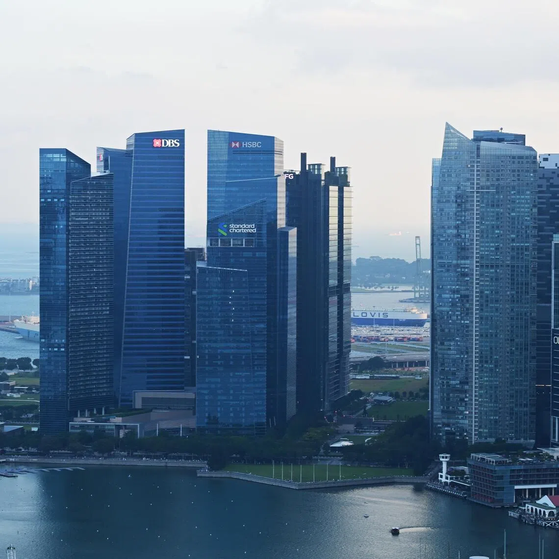 JPMorgan Chase & Co raised its target for Singapore stocks, due to its  economic growth, strong Singapore dollar, and a narrowing valuation gap with other developed-market peers.