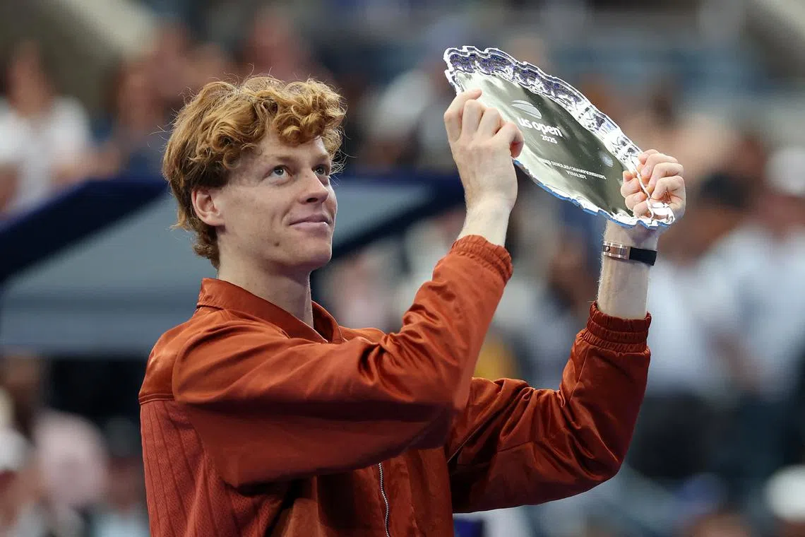 Tennis - U.S. Open - Flushing Meadows, New York, United States - September 7, 2025 Italy's Jannik Sinner holds the runner up trophy after losing the men's singles final to Spain's Carlos Alcaraz REUTERS/Mike Segar