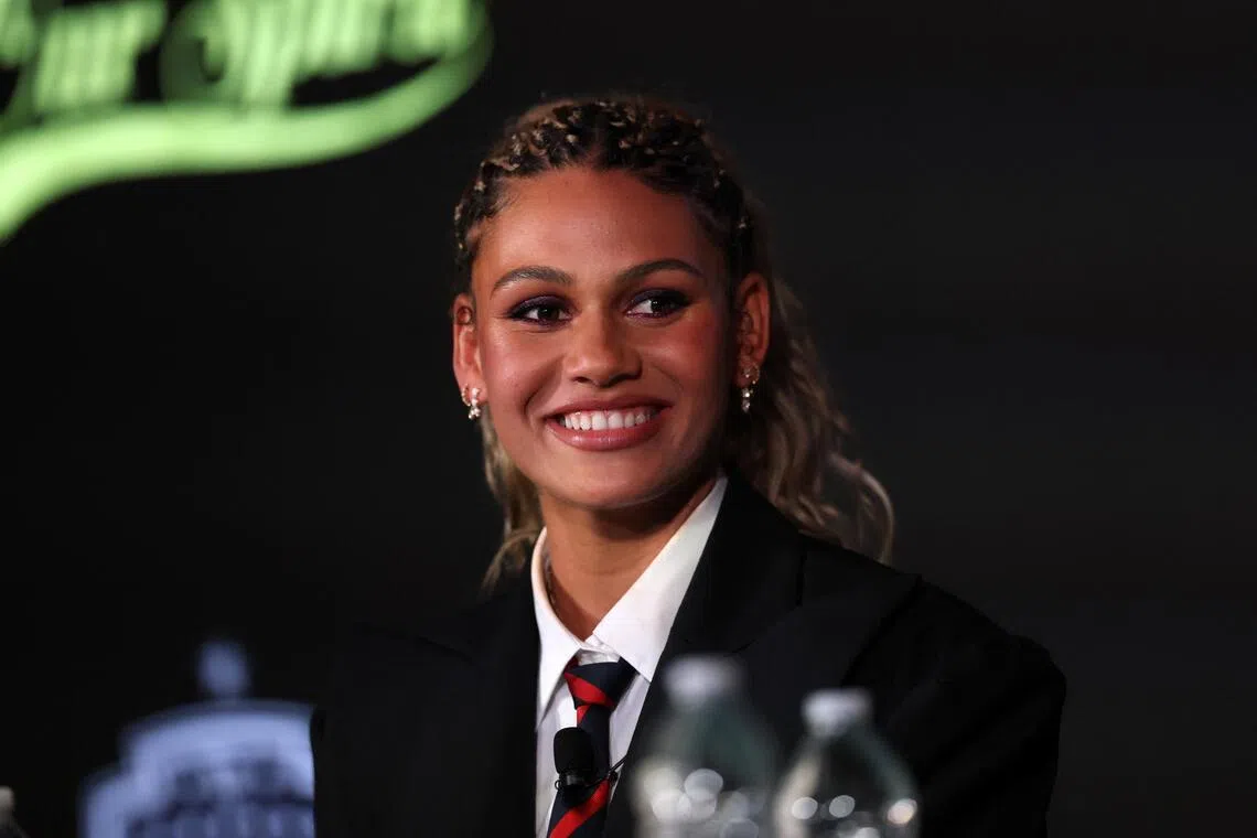 Trinity Rodman of the Washington Spirit answers questions during a press conference at BMO Stadium.