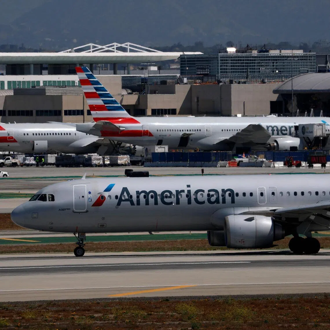 An American Airlines plane taxis at Los Angeles International Airport on April 23. The first direct flight between the US and Venezuela in seven years was set to take off on April 30.