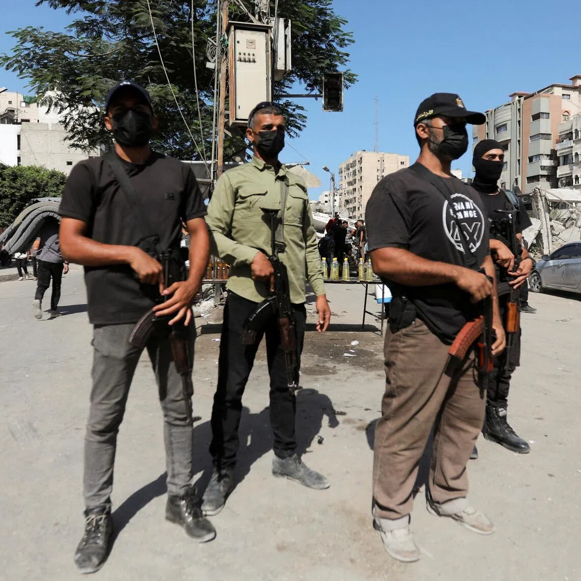 Hamas police officers stand guard, amid a ceasefire between Israel and Hamas, in Gaza City, on Oct 11.