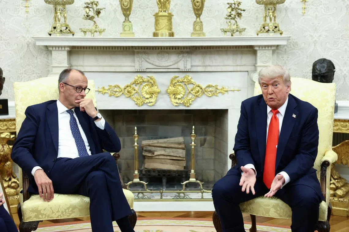 U.S. President Donald Trump (right) unloaded on SpaceX and Tesla boss Mr Musk in the Oval Office, next to visiting German Chancellor Friedrich Merz.