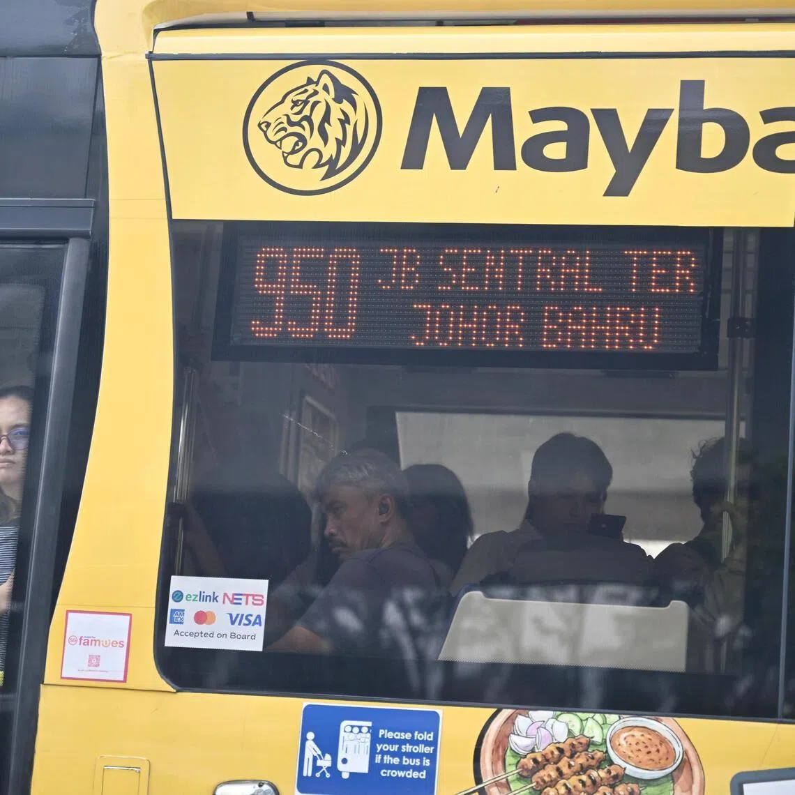 Commuters from Johor cross the border daily using public transport such as the Causeway Link bus service.