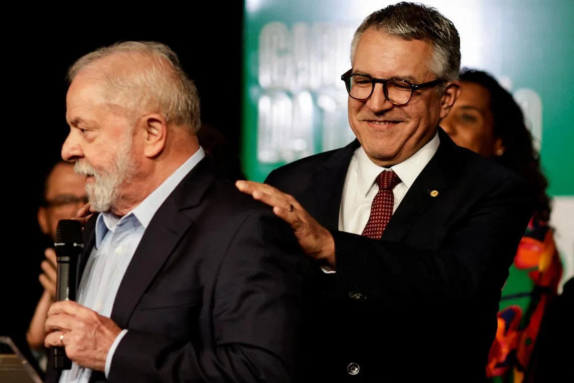 FILE PHOTO: Alexandre Padilha greets Brazilian President Luiz Inacio Lula da Silva in Brasilia, Brazil December 22, 2022. REUTERS/Ueslei Marcelino/File Photo