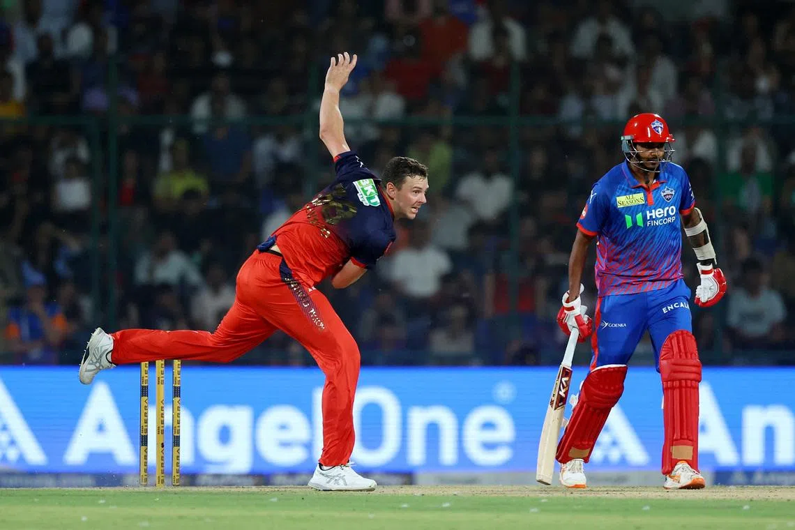 Cricket - Indian Premier League - IPL - Delhi Capitals v Royal Challengers Bengaluru - Arun Jaitley Stadium, New Delhi, India - April 27, 2026 Royal Challengers Bengaluru's Josh Hazlewood in action REUTERS/Anushree Fadnavis