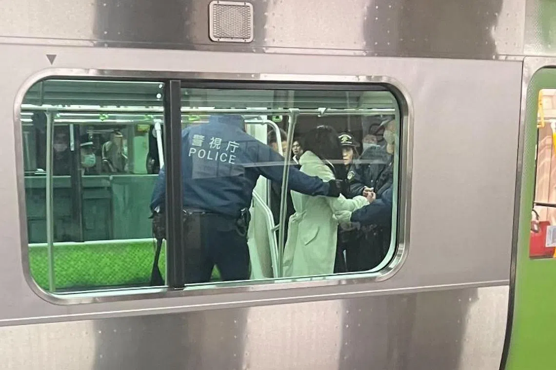 NHK said a report was made that a woman was wielding a knife on a train at Akihabara Station.