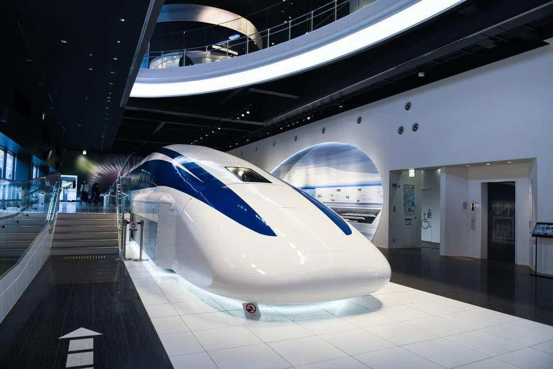 A magnetic levitation (maglev) train exhibited at Yamanashi Prefectural Maglev Exhibition Center in Tsuru, Yamanashi Prefecture, Japan, on Monday, Nov. 16, 2020. Japan and China are racing to build a new type of ultra-fast, levitating train, seeking to demonstrate their mastery over a technology with big export potential. Photographer: Noriko Hayashi/Bloomberg