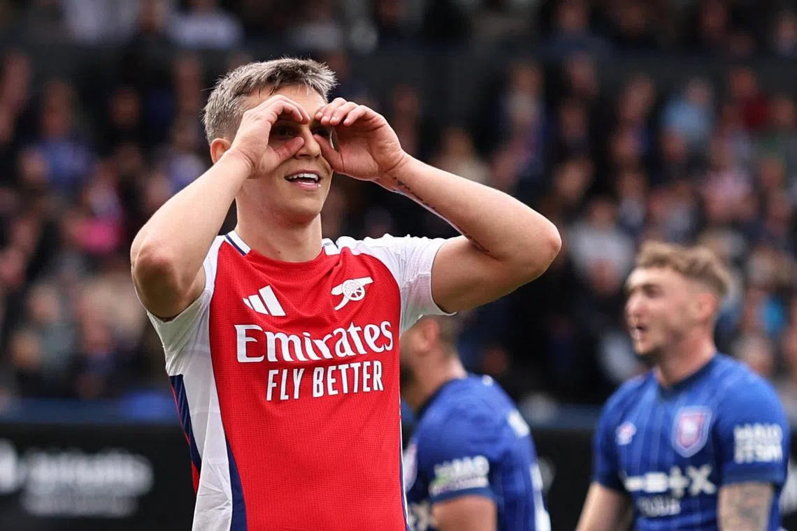 Arsenal's Leandro Trossard celebrates scoring their third goal and his second during a 4-0 English Premier League win over Ipswich Town at Portman Road on April 20.