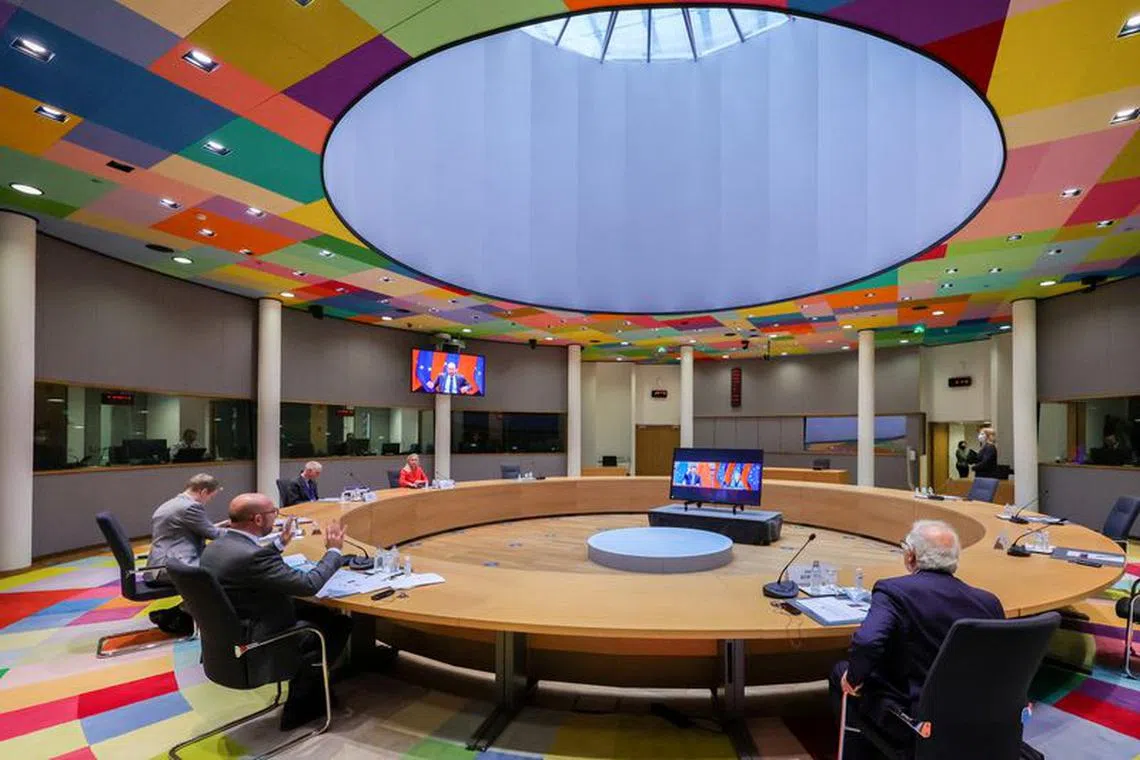FILE PHOTO: European Council President Charles Michel and European Union foreign policy chief Josep Borrell speak with European Commission President Ursula von der Leyen and the Chinese President Xi Jinping via video conference during an EU-China summit at the European Council building in Brussels, Belgium April 1, 2022. Olivier Matthys/Pool via REUTERS/File Photo