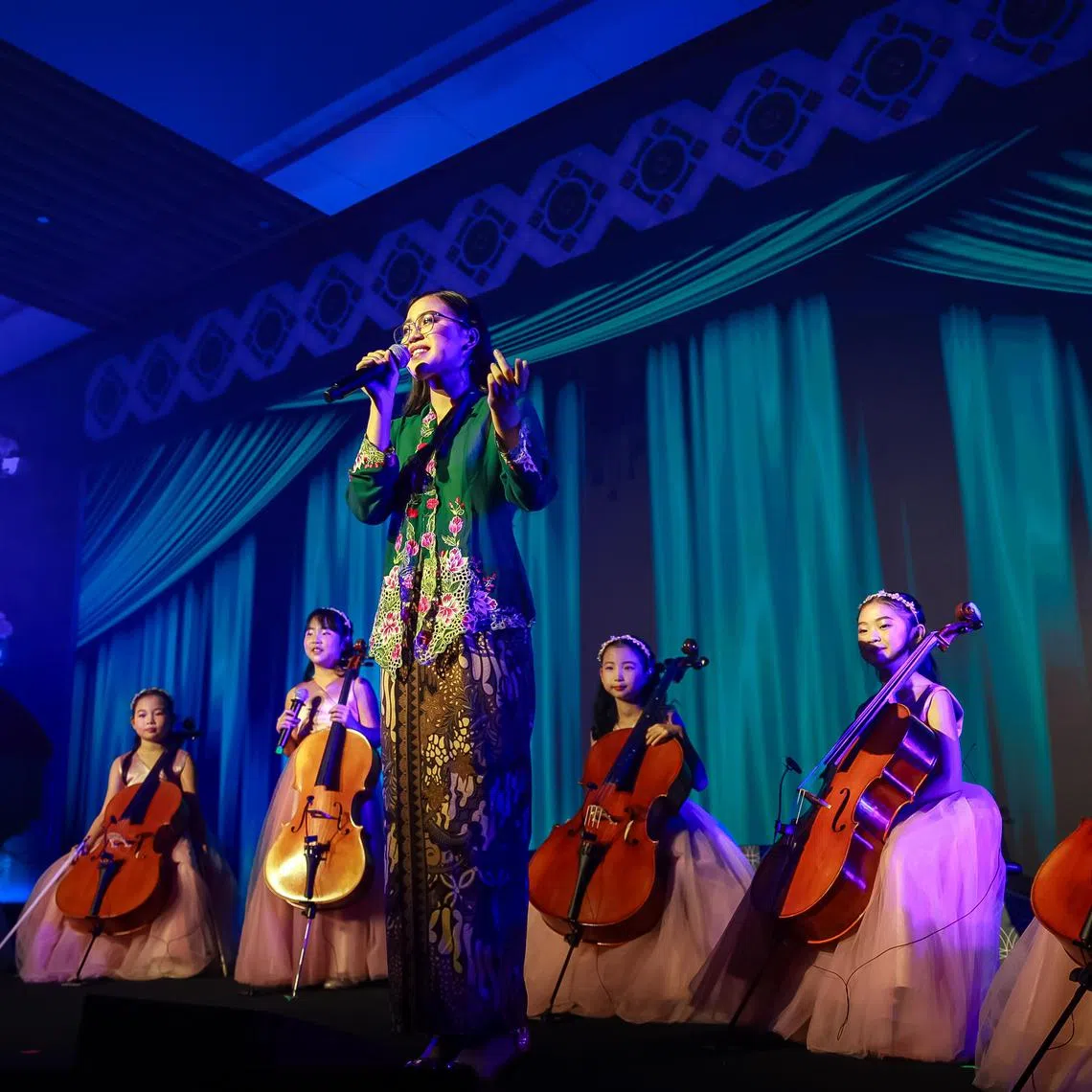ChildAid performers dancing and singing at ChildAid held at the Singapore Chinese Cultural Centre, Dec 4, 2023.