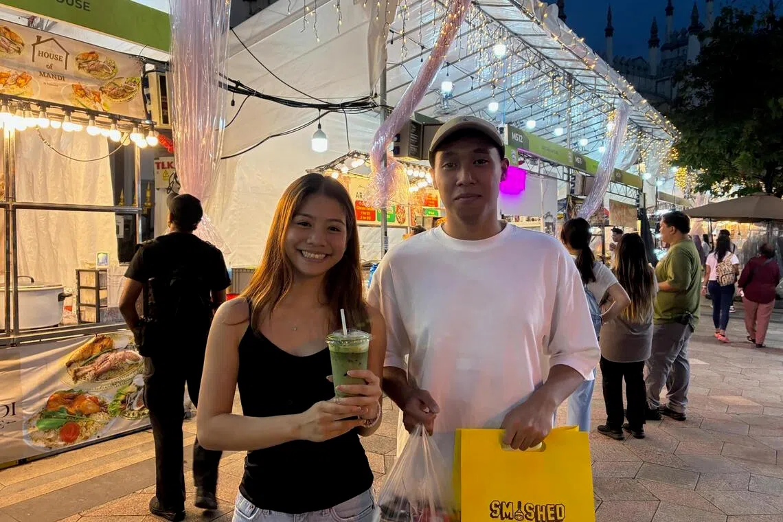 Ms Esther Suzanna Pang Ern Ai and Mr Muhammad Rayyan Bin Mazlan at the Gemilang Kampong Gelam Ramadan Bazaar.