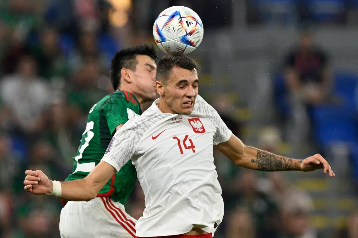 Jakub Kiwior in action for Poland against Mexico, during the Qatar 2022 World Cup.