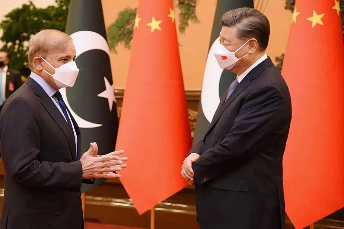 Pakistan's Prime Minister Shehbaz Sharif meets Chinese President Xi Jinping during his two-day visit in Beijing on Nov 2, 2022.