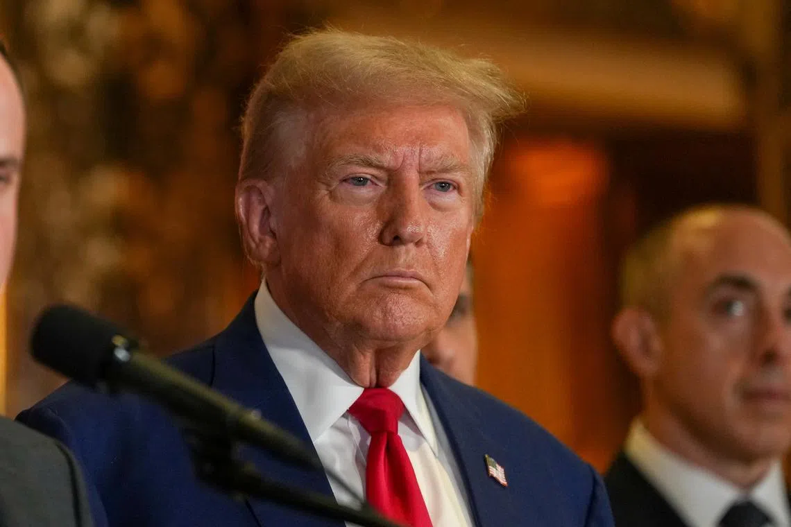 FILE PHOTO: Republican presidential nominee and former U.S. President Donald Trump looks on during a press conference at Trump Tower in New York City, U.S., September 6, 2024. REUTERS/David Dee Delgado/File Photo