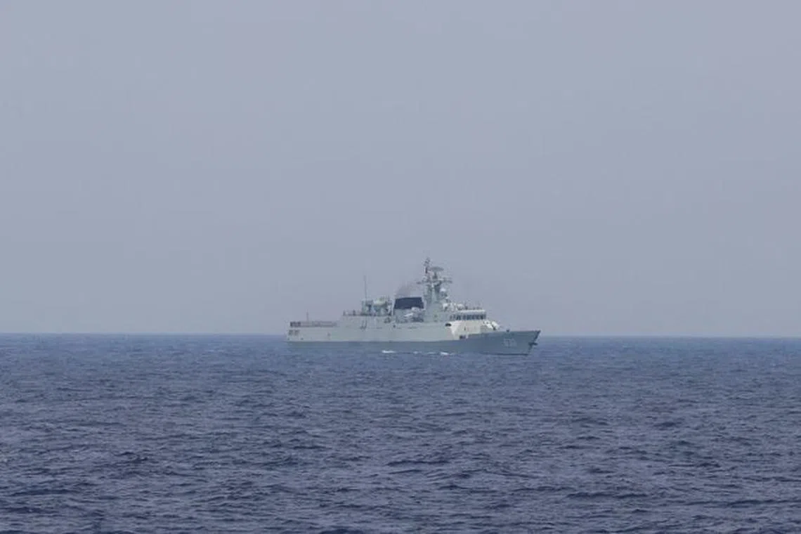 A Chinese navy ship is seen sailing in the South China Sea, October 4, 2023. REUTERS/Adrian Portugal/File Photo