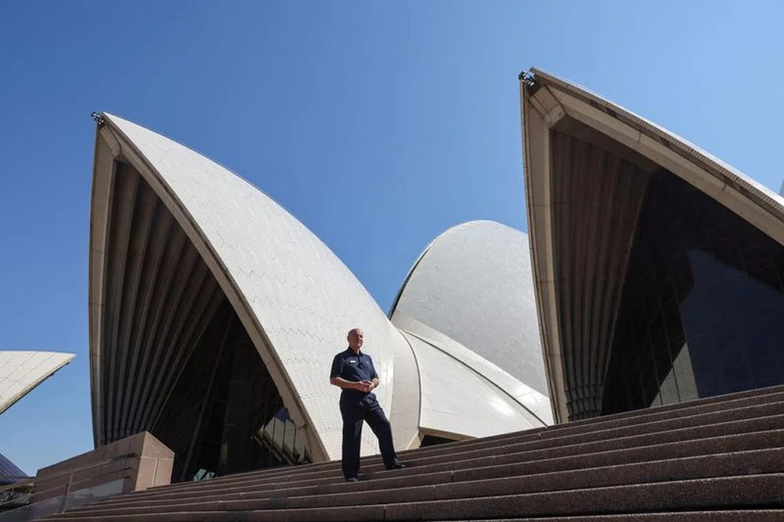 FILE PHOTO: Former architect and tour guide Peter Sekules poses for a photo at the Sydney Opera House in Sydney, Australia September 29, 2023. REUTERS/Alasdair Pal/File Photo