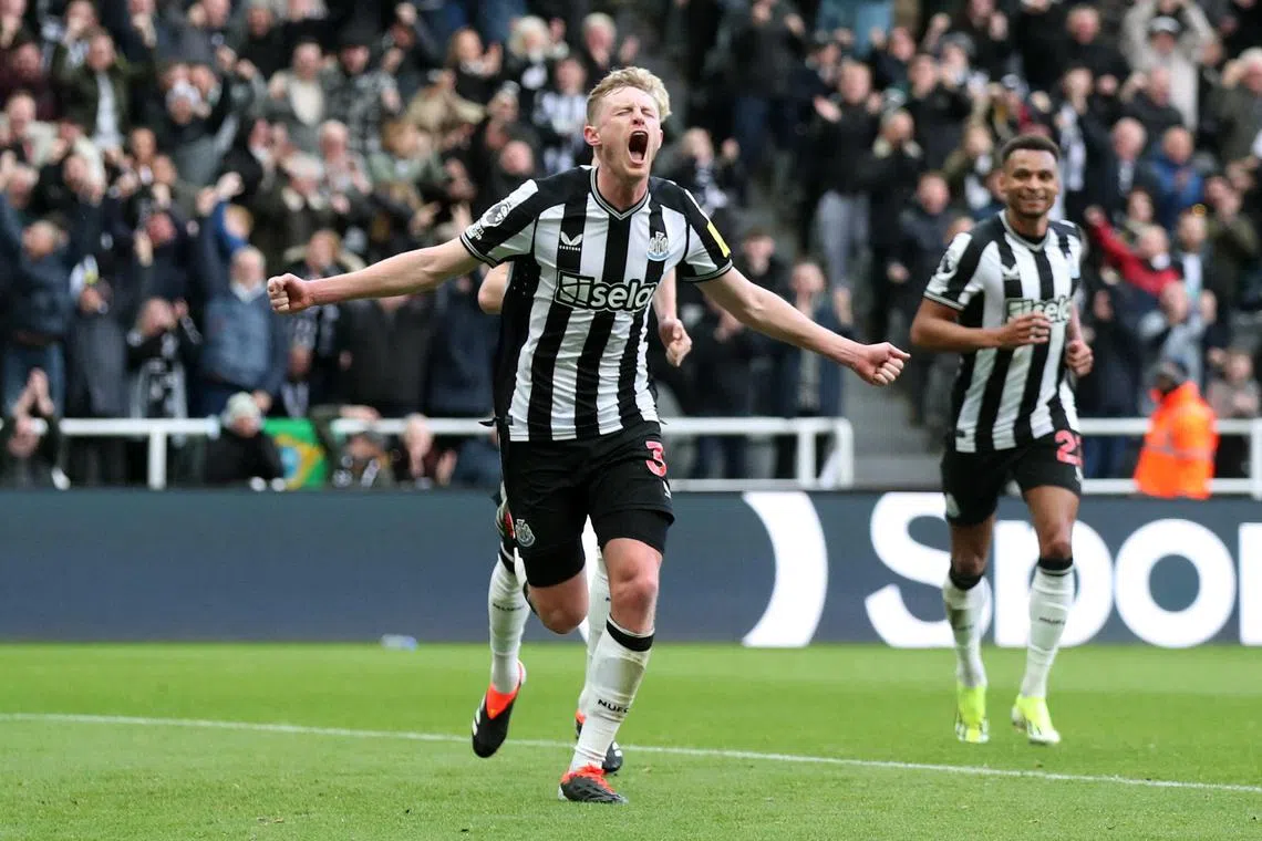Newcastle United's Sean Longstaff celebrates scoring their second goal.