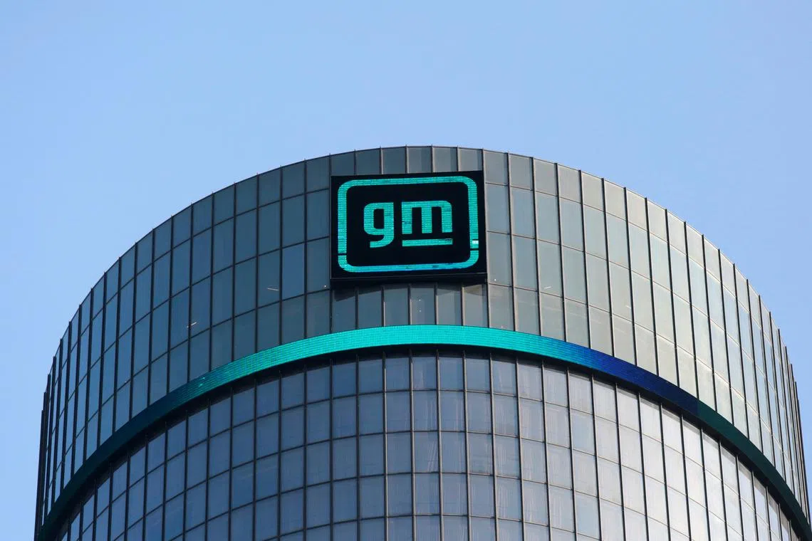 FILE PHOTO: The new GM logo is seen on the facade of the General Motors headquarters in Detroit, Michigan, U.S., March 16, 2021. Picture taken March 16, 2021.  REUTERS/Rebecca Cook/File Photo