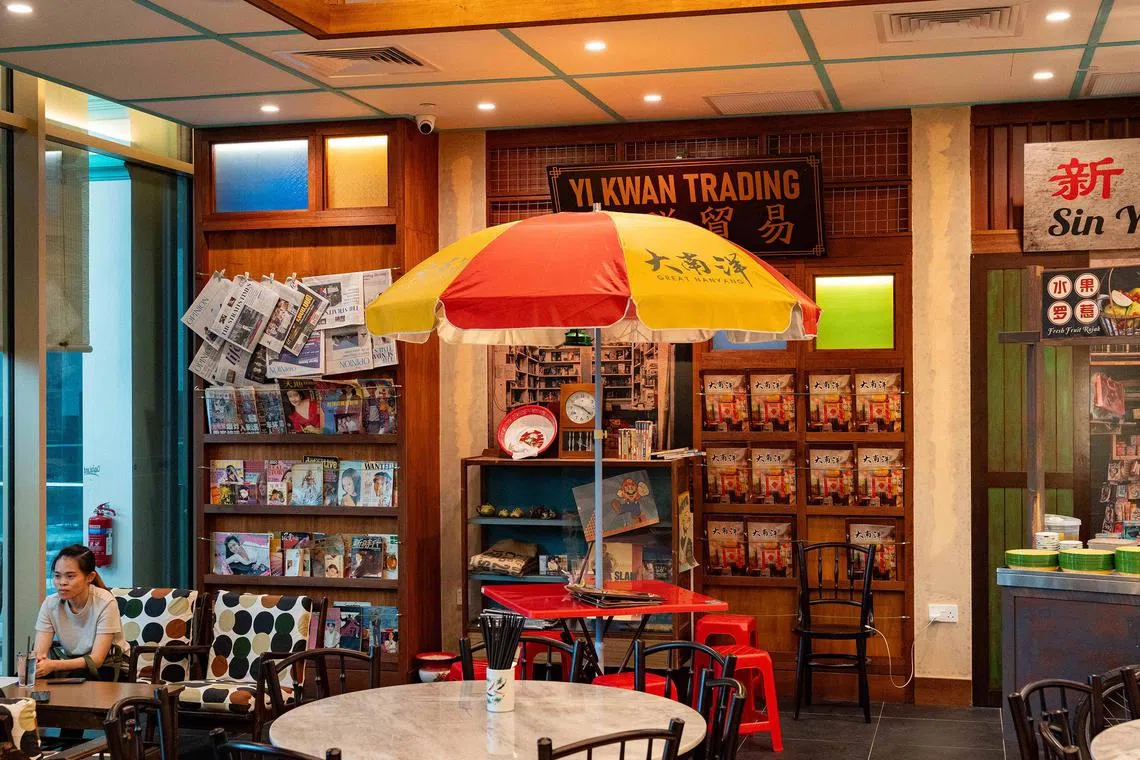 mccafe - Retro-themed Great Nanyang Heritage Cafe is decorated with items from the past, from old telephones to sewing machines. It is founded by Mr Keith Kang (pictured). 
Credit: Great Nanyang Heritage Cafe