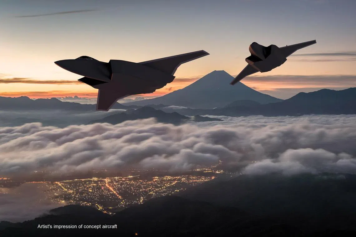 An undated handout photo made available by Japan's Defense Ministry shows an artist's impression of two next-generation fighter jets flying in the airspace near Mount Fuji in Japan. A next-generation fighter jet is to be jointly developed by Japan, Italy and Britain by 2035.