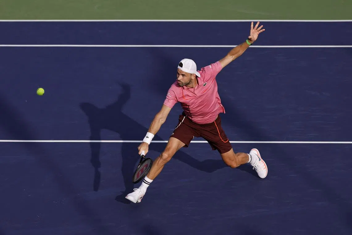 FILE PHOTO: Tennis - Shanghai Masters - Qizhong Forest Sports City Arena, Shanghai, China - October 8, 2024 Bulgaria's Grigor Dimitrov in action during his round of 32 match against Australia's Alexei Popyrin REUTERS/Tingshu Wang/File Photo