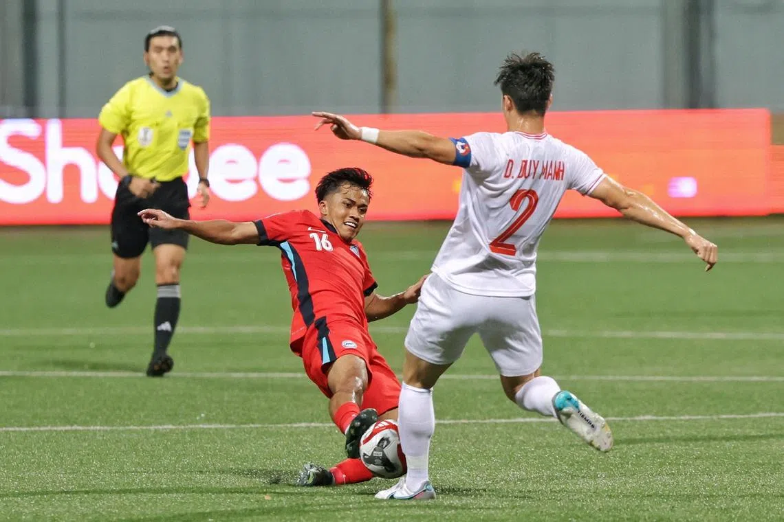Singapore midfielder Hami Syahin (in red) believes the Lions can turn around a 2-0 deficit against Vietnam in the Asean Cup semi-finals
